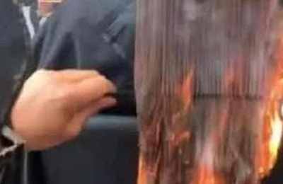 梦见被火烧头发